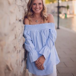 Off the shoulder blue and white top! Bow in back!